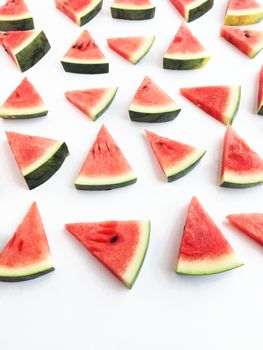 slices of watermelon on white background