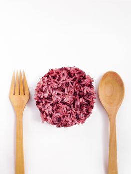 Thai white rice and rice berry mixed with spoon and fork on white background