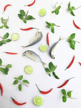 short mackerel  with chili paper mint and lime