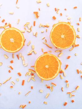 Fresh orange and slices on white background.