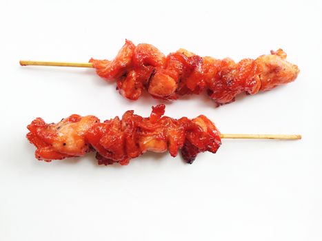 Grilled chicken on bamboo skewers