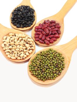 Varieties of beans, peas on white background