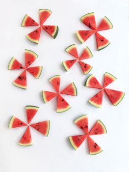 slices of watermelon on white background