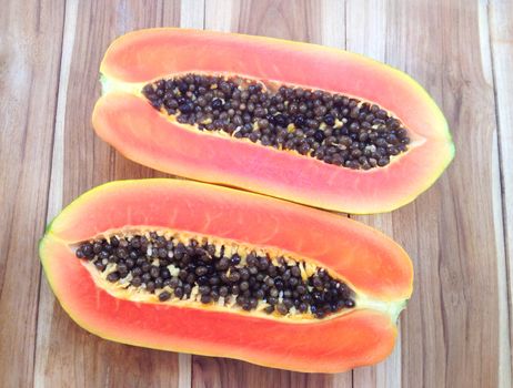 Sweet papaya on wooden background