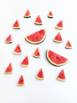 slices of watermelon on white background