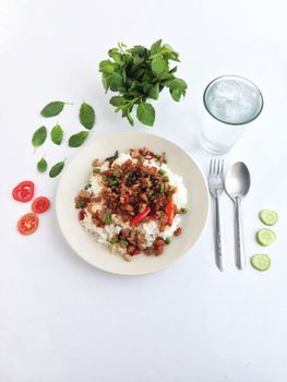 pork with chili & Basil leaves on Steamed rice