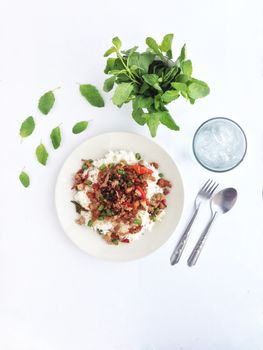 pork with chili & Basil leaves on Steamed rice