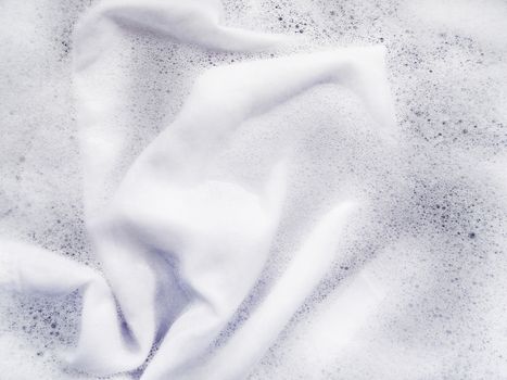 Soak a cloth before washing, white cloth