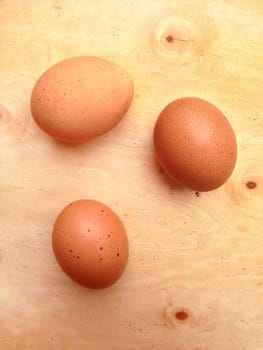 chicken egg a on wooden background