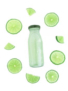 Bottle of lime drinks and Cut into wedges, white background