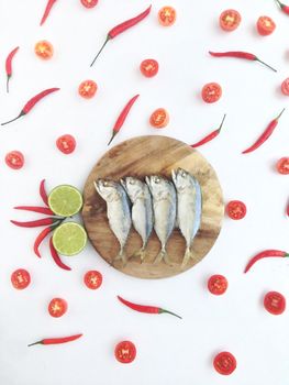 short mackerel among lime chili and tomato