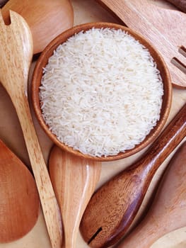 Thai rice on wooden background