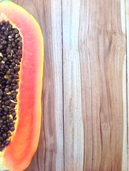 Sweet papaya on wooden background