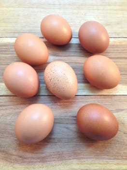 Eggs on wood background