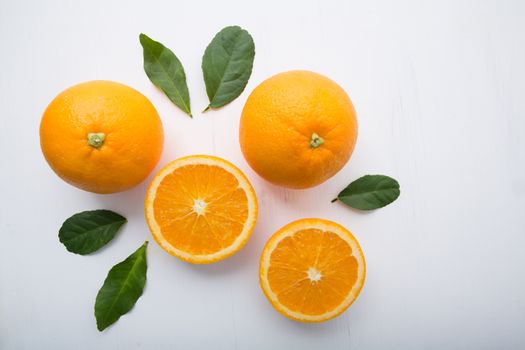 Fresh orange citrus fruit on white background. Top view