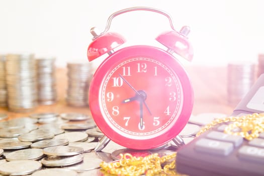 Stack Of Coins With Red Fashioned Alarm Clock For Display Planning Money Financial And Business Accounting Concept, Time To Work At Make Money Concept, Vintage Color Tone