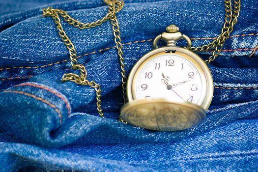 Image Of Blue Jeans Denim Texture And Vintage Pocket Watch