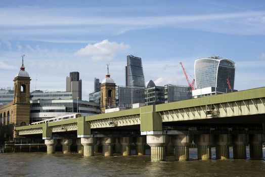 canon street railway bridge over the river thames in london city