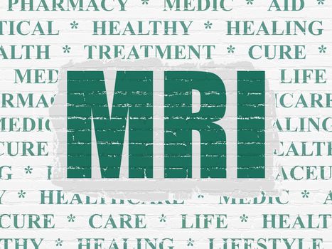 Medicine concept: Painted green text MRI on White Brick wall background with  Tag Cloud