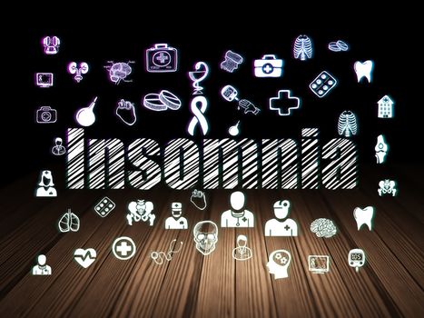 Healthcare concept: Glowing text Insomnia,  Hand Drawn Medicine Icons in grunge dark room with Wooden Floor, black background