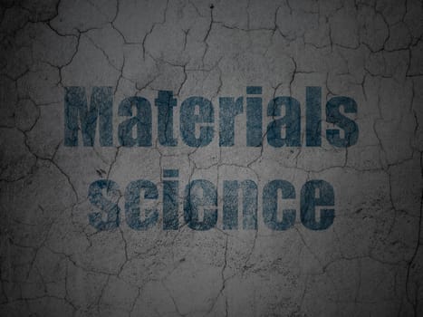 Science concept: Blue Materials Science on grunge textured concrete wall background