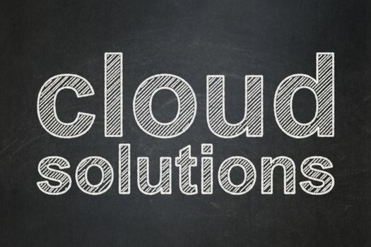 Cloud technology concept: text Cloud Solutions on Black chalkboard background