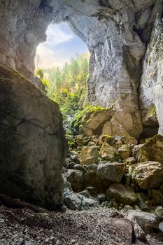 Cetatile cave in romania. Natural citadel sculpted by river in romanian mountainsin morning light