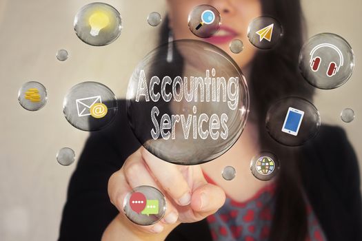 Portrait of a beautiful young woman pointing her finger to Accounting Services  in transparent bubble