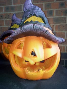 smiled pumpkin for halloween in blue hat