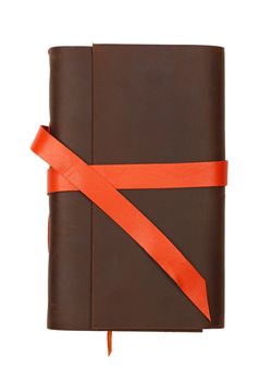 Close up of one vintage style jotter notebook with old leather cover and orange bookmark strap, isolated on white, elevated top view, directly above