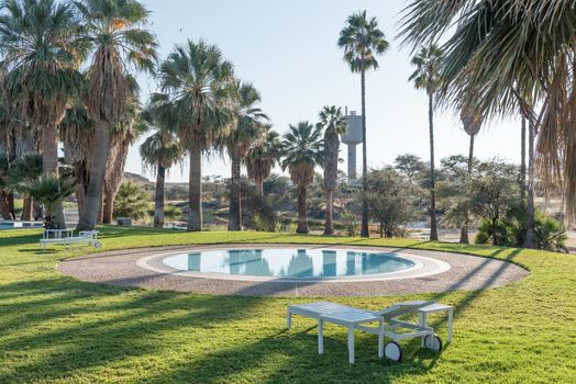 A swimming pool with a reservoir in the back at Gross Barmen, near Okahandja in the Otjozondjupa Region of Namibia