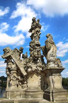 Statuary of the Madonna and St. Bernard on the Charles Bridge (Karluv Most) in Prague, Czech Republic