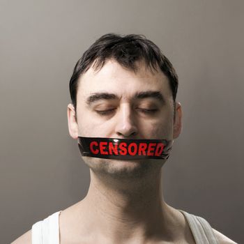 man's portrait with black censored tape on his face