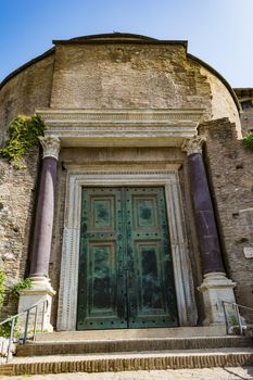 Temple of Romulus door in the Roman Forum, Rome, Italy. It's intact because it was turned into the entrance to the Church of Saints Cosma and Damiano.