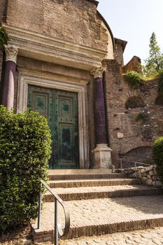 Temple of Romulus door in the Roman Forum, Rome, Italy. It's intact because it was turned into the entrance to the Church of Saints Cosma and Damiano.