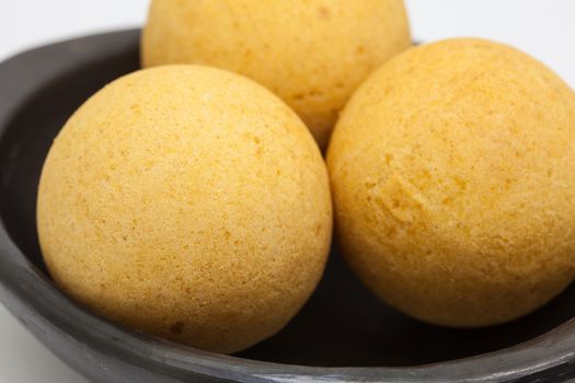 Traditional Colombian buñuelos (Deep Fried Cheese Bread) isolated on white background