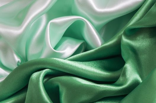 a elegant background with a green fabric