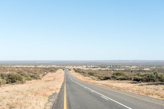 The N8-road and the bridge over the Vaal River with Schmidtsfrift, a village in the Northern Cape Province of South Africa, in the back