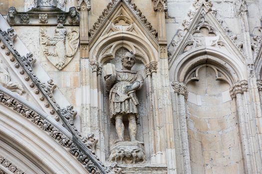 stone carving of a knight on York Minster wall