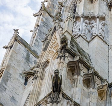 stone statues with restoration on York Minster wall