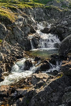 Small waterfall near Honningsvag, Norway
