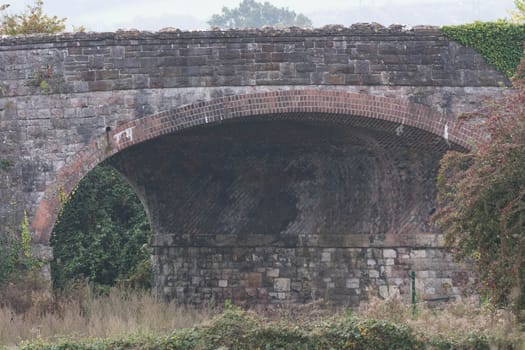 an old brick arched bridge