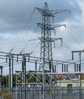 an electricity substation with pylon