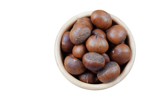 Chestnuts roasted in a bowl on white background.