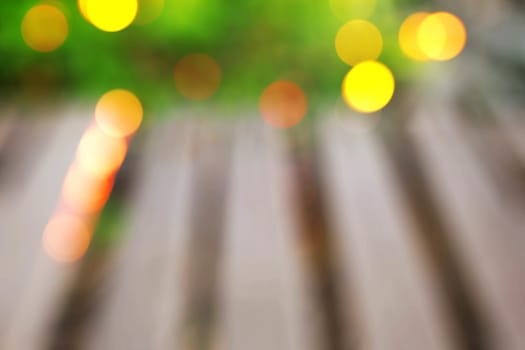 Wooden walkways in the garden with blurred images.