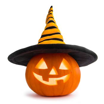 Jack O Lantern Halloween pumpkin with witches hat isolated on white background