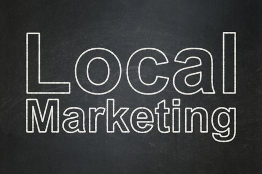 Advertising concept: text Local Marketing on Black chalkboard background