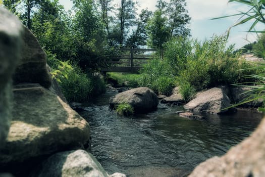 View between stones on a small river