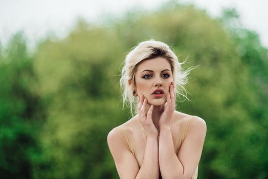 model girl dress gold angel posing in the woods near the old columns