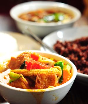 Vegetarian Thai Food red curry soup served with brown rice